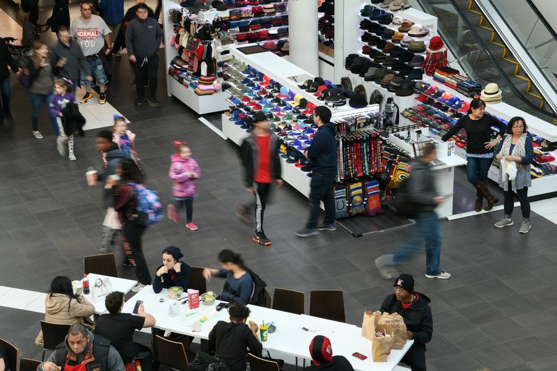 &copy; Reuters. FILE PHOTO: Shoppers look for deals at the Pentagon City Mall in Arlington, Virginia, U.S., November 29, 2019. REUTERS/Loren Elliott/File Photo