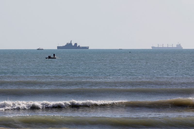 &copy; Reuters. Boats are seen off the coast of Gabes where a merchant fuel ship sank, Tunisia April 17, 2022. REUTERS/Zoubeir Souissi
