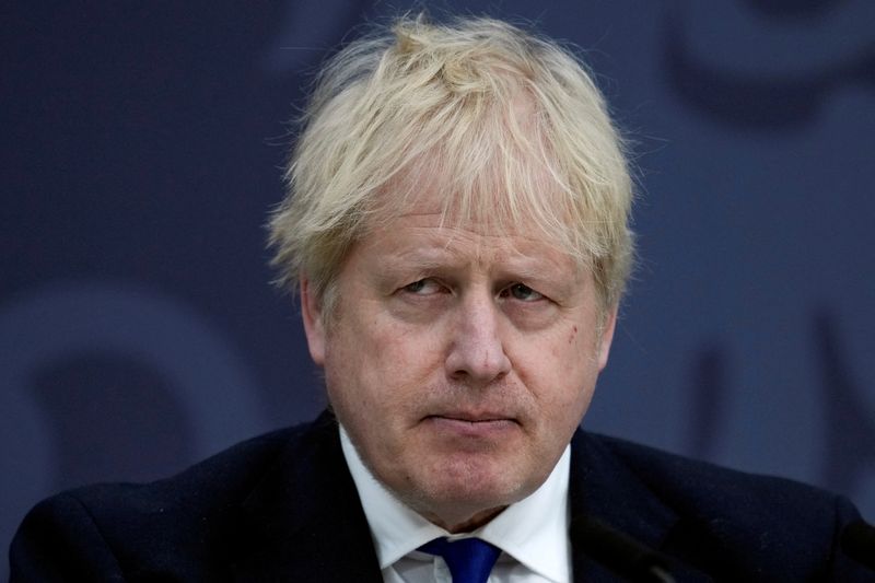 &copy; Reuters. FILE PHOTO: British Prime Minister Boris Johnson looks on while delivering a speech on immigration, at Lydd Airport, Britain April 14, 2022. Matt Dunham/Pool via REUTERS