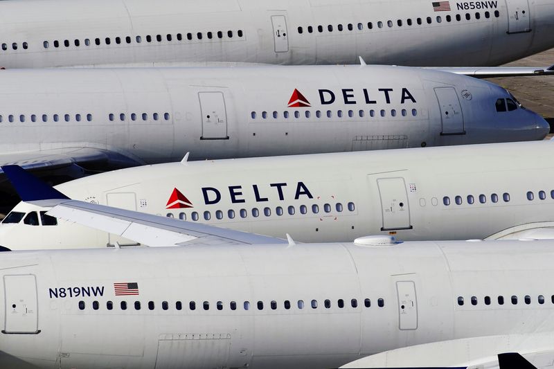 &copy; Reuters. FILE PHOTO: Delta Air Lines passenger planes are seen parked due to flight reductions made to slow the spread of coronavirus disease (COVID-19), at Birmingham-Shuttlesworth International Airport in Birmingham, Alabama, U.S. March 25, 2020. REUTERS/Elijah 