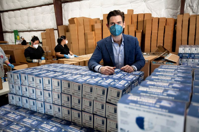 &copy; Reuters. FILE PHOTO: Armbrust American founder and Chief Executive Officer Lloyd Armbrust displays some of his masks at his company's warehouse in Pflugerville, Texas, U.S., January 12, 2022.  REUTERS/Nuri Vallbona/File Photo