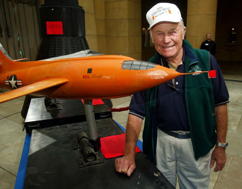 &copy; Reuters. FILE PHOTO: General Chuck Yeager, the first pilot to break the sound barrier in the Bell X-1 Glamorous Glinnis in October 1947, poses next to a minature of the plane used in the film "The Right Stuff," at a screening June 9, 2003 in Hollywood. REUTERS/Fre