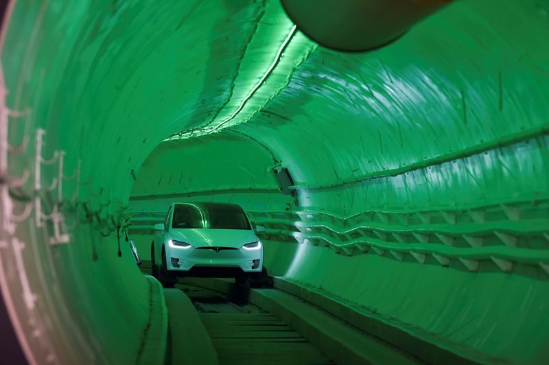 &copy; Reuters. FILE PHOTO: A modified Tesla Model X drives into the tunnel entrance before an unveiling event for the Boring Co. Hawthorne test tunnel in Hawthorne, California, U.S., on December 18, 2018. Robyn Beck/Pool via REUTERS