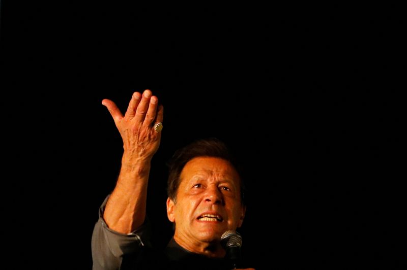 &copy; Reuters. Ousted Pakistani Prime Minister Imran Khan gestures as he addresses supporters during a rally, in Karachi, Pakistan April 16, 2022. REUTERS/Akhtar Soomro