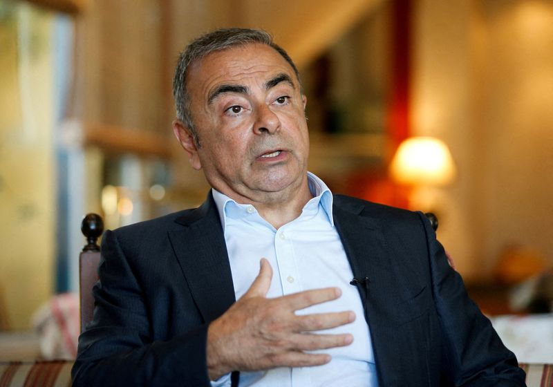 &copy; Reuters. FILE PHOTO: Fugitive former car executive Carlos Ghosn, gestures as he talks during an interview with Reuters in Beirut, Lebanon June 14, 2021. REUTERS/Mohamed Azakir/File Photo