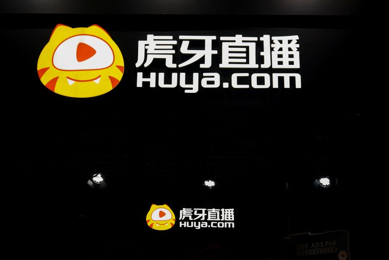 Sources say Huya cuts hundreds of employees as Chinese tech retreats
