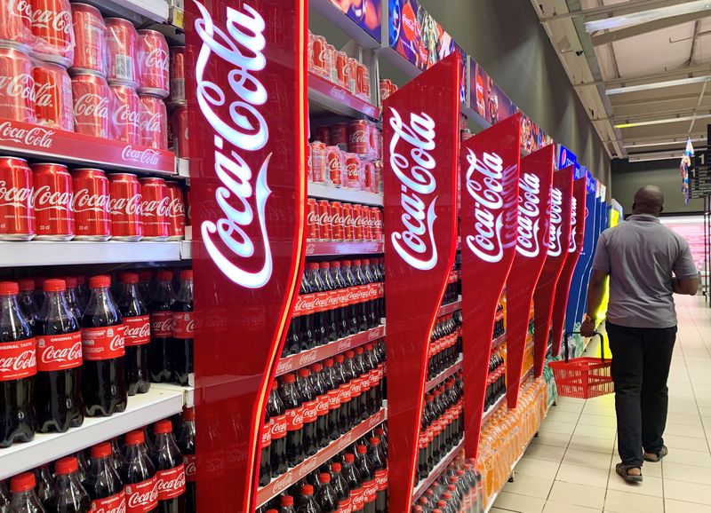 &copy; Reuters. FILE PHOTO: A man walks past shelves of Coca-Cola bottles and cans at a Shoprite store inside Palms shopping mall in Lagos, Nigeria November 5, 2019. REUTERS/Temilade Adelaja/File Photo
