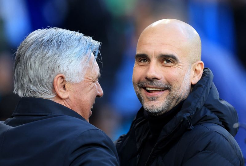 &copy; Reuters. Técnicos Pep Guardiola e Carlo Ancelotti antes de jogo City x Real Madrid no estádio Etihad
26/04/2022
Action Images via Reuters/Lee Smith