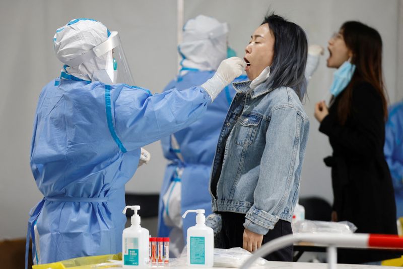 China's capital in race to detect COVID cases, avoid Shanghai's distress