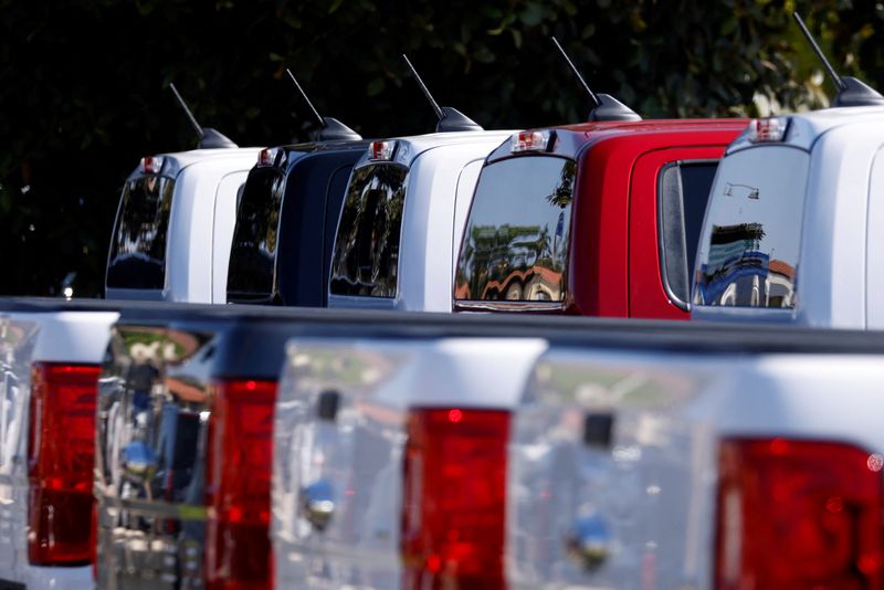 &copy; Reuters. FILE PHOTO: Ford pickup trucks are shown for sale in Carlsbad, California, U.S., September 23, 2020.   REUTERS/Mike Blake/File Photo