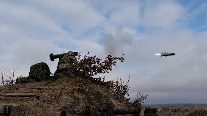 &copy; Reuters. FILE PHOTO: Service members of the Ukrainian Armed Forces fire a Javelin anti-tank missile during drills at a training ground in an unknown location in Ukraine, in this handout picture released February 18, 2022. Ukrainian Joint Forces Operation Press Ser
