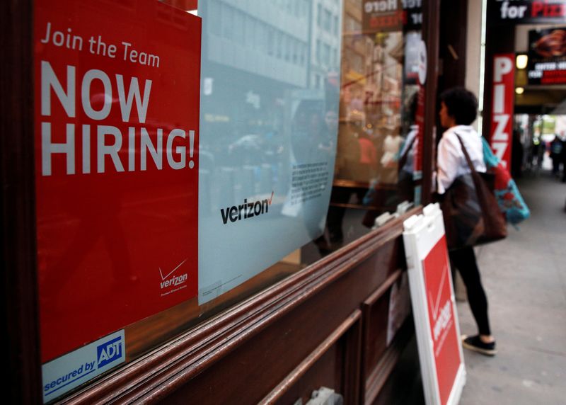 &copy; Reuters. FILE PHOTO: A "Now Hiring" sign is posted on a Verizon store in Manhattan in New York City, U.S., May 10, 2016.  REUTERS/Brendan McDermid/File Photo