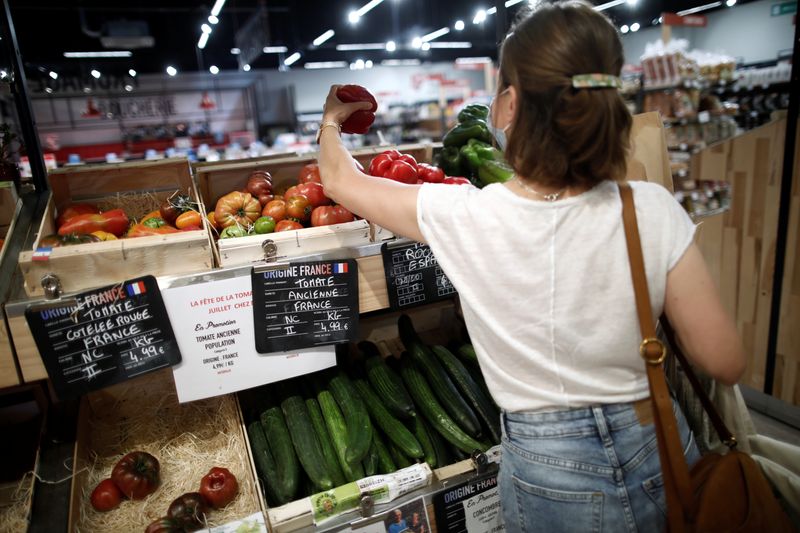 &copy; Reuters. FILE PHOTO: A customer shops for vegetables at a Naturalia organic foods grocery store operated by Casino Group, following the outbreak of the coronavirus disease (COVID-19), in Bretigny-sur-Orge, near Paris, France, July 30, 2020. REUTERS/Benoit Tessier