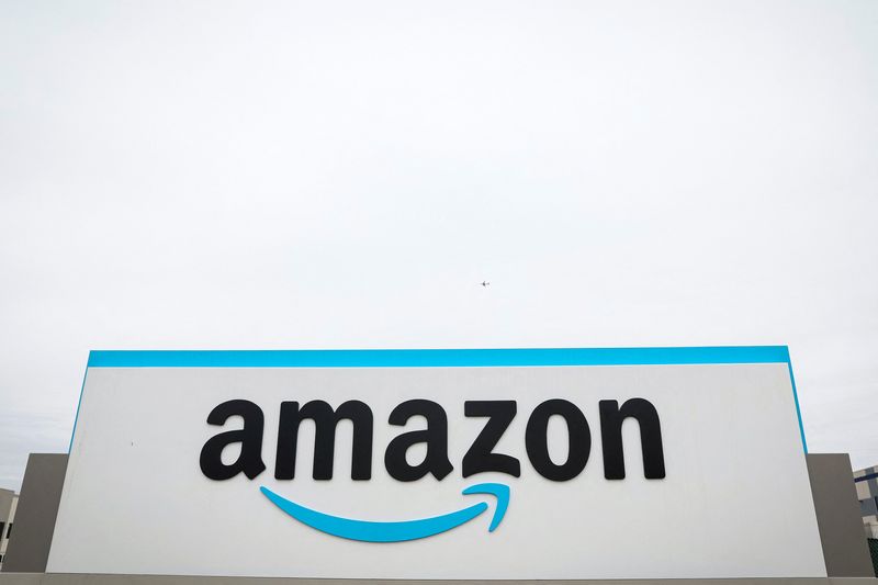 &copy; Reuters. FILE PHOTO: The Amazon logo is displayed on a sign outside the company's LDJ5 sortation center, as employees begin voting to unionize a second warehouse in the Staten Island borough of New York City, U.S. April 25, 2022.  REUTERS/Brendan McDermid.