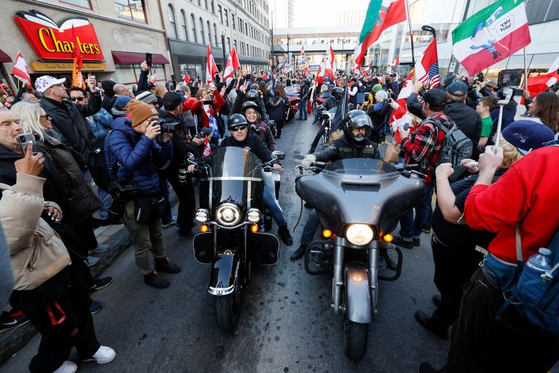 Police arrest several in Canadian capital as bikers parade turns unruly