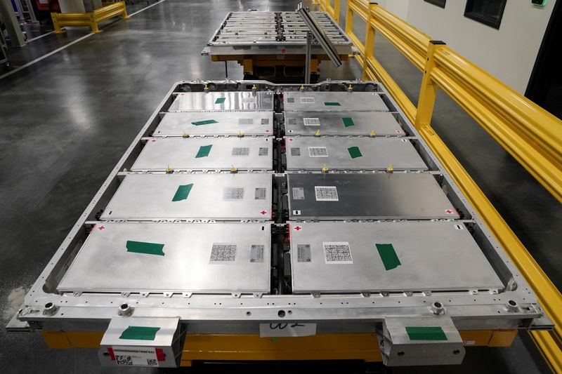 &copy; Reuters. FILE PHOTO: Battery trays with battery modules installed are seen during a tour at the opening of a Mercedes-Benz electric vehicle Battery Factory, marking one of only seven locations producing batteries for their fully electric Mercedes-EQ models, in Woo