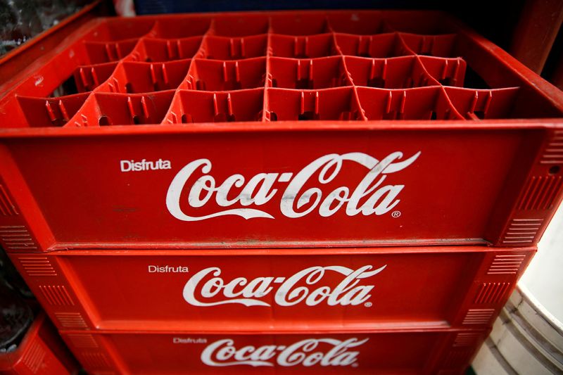 &copy; Reuters. FILE PHOTO: Empty Coca-Cola cases are seen at a food stall on the street in Caracas, Venezuela May 24, 2016. REUTERS/Carlos Garcia Rawlins