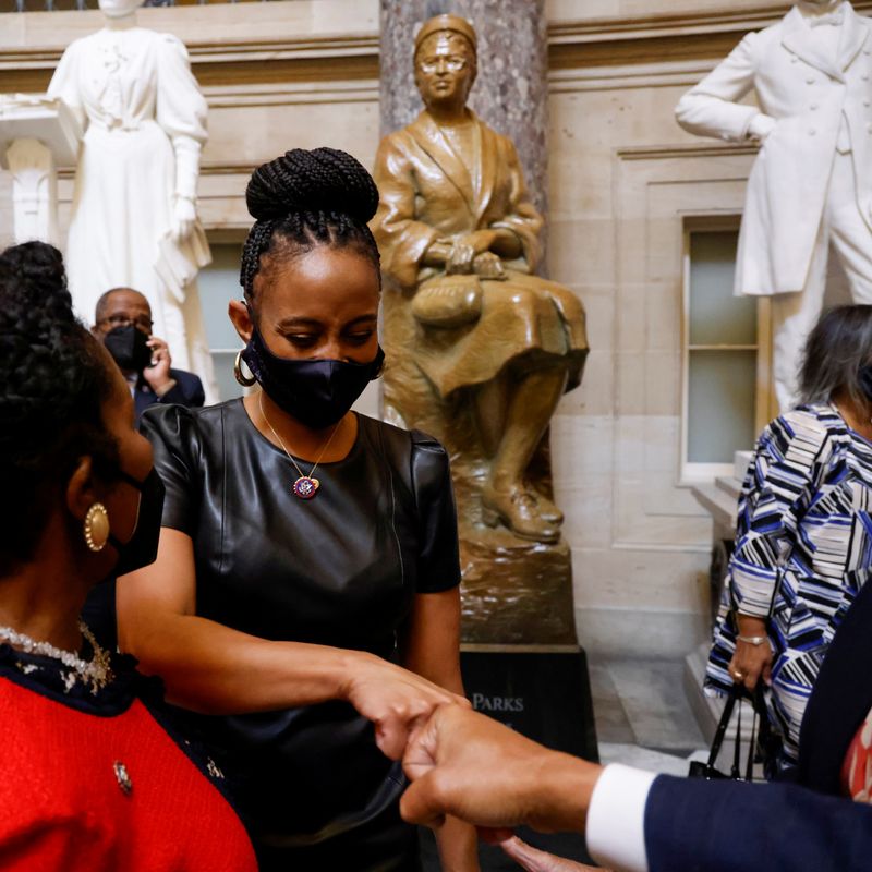 &copy; Reuters. FILE PHOTO: Newly-seated U.S. Representative Shontel Brown (D-OH) reacts after being sworn in as a member of the Congressional Black Caucus, at the feet of a statue of civil rights leader Rosa Parks at the U.S. Capitol in Washington, U.S. November 4, 2021