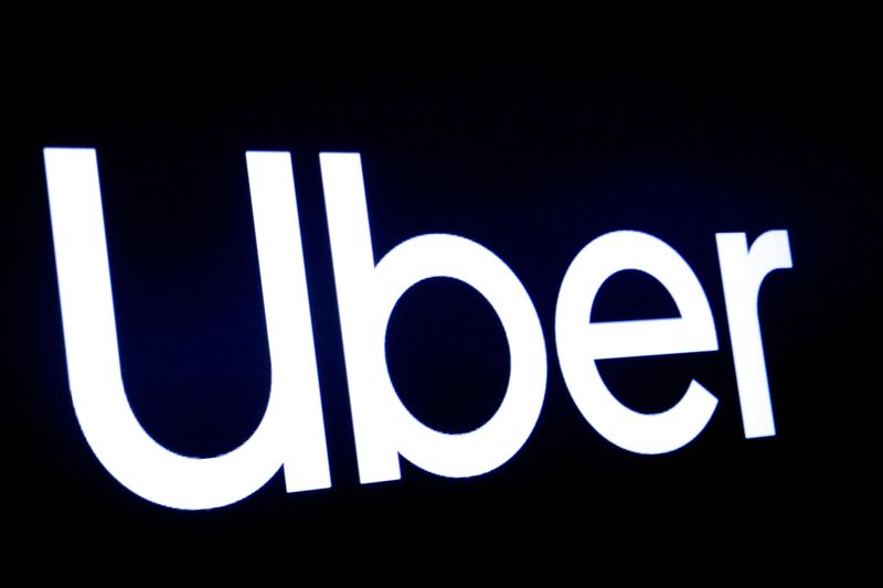 © Reuters. FILE PHOTO: A screen displays the company logo for Uber Technologies Inc at the New York Stock Exchange (NYSE) in New York, U.S., May 10, 2019. REUTERS/Brendan McDermid/File Photo/File Photo