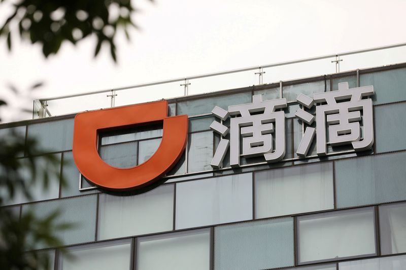 &copy; Reuters. FILE PHOTO: A sign of Chinese ride-hailing service Didi is seen on its headquarters in Beijing, China July 5, 2021. REUTERS/Tingshu Wang