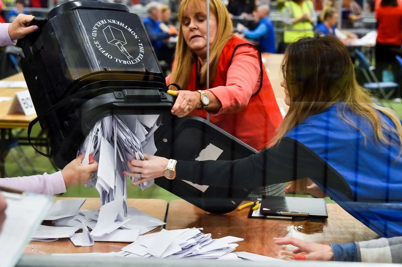 &copy; Reuters. Electoral officers empty a ballot box to count ballots during the Northern Ireland Assembly Elections at the Meadowbank Sports Arena, in Magherafelt, Northern Ireland, May 6, 2022. REUTERS/Clodagh Kilcoyne