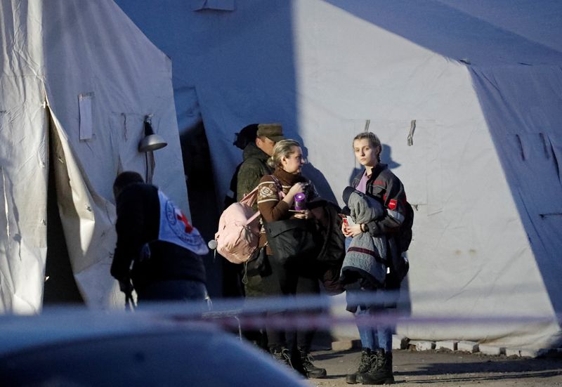 &copy; Reuters. Women evacuated from Azovstal steel plant in Mariupol are seen at a temporary accommodation centre in the village of Bezimenne, during Ukraine-Russia conflict in the Donetsk Region, Ukraine May 6, 2022. REUTERS/Alexander Ermochenko