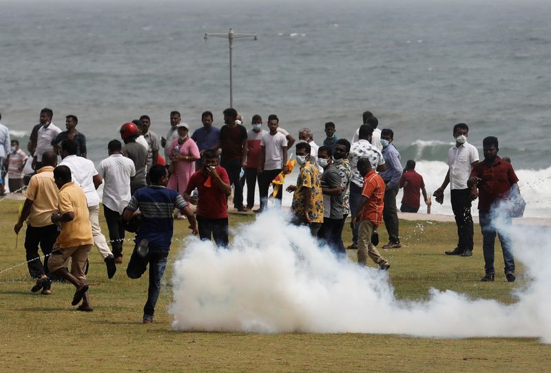 Sri Lanka prime minister resigns, curfew imposed after clashes