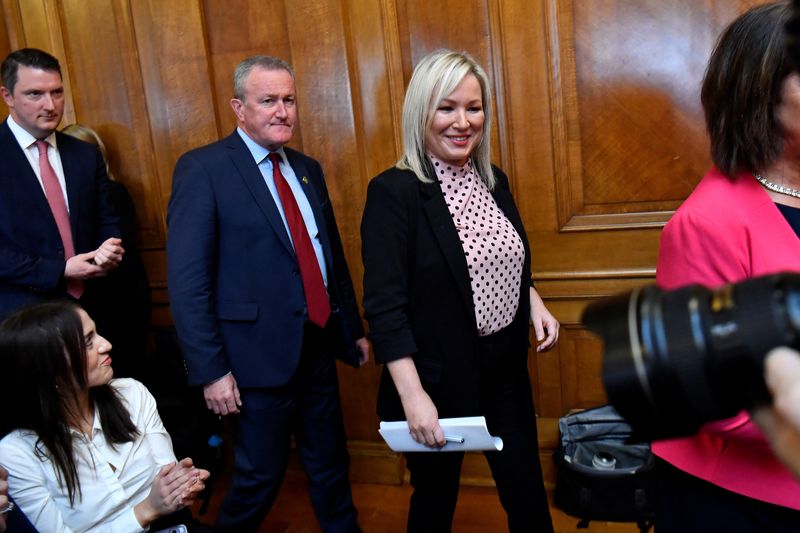 © Reuters. Sinn Fein deputy leader Michelle O'Neill arrives for a press conference with Finance Minister Conor Murphy and Sinn Fein MP John Finucane, at Stormont parliament buildings after a meeting with the Secretary of State for Northern Ireland to form a power-sharing government, in Belfast, Northern Ireland, May 9, 2022. REUTERS/Clodagh Kilcoyne
