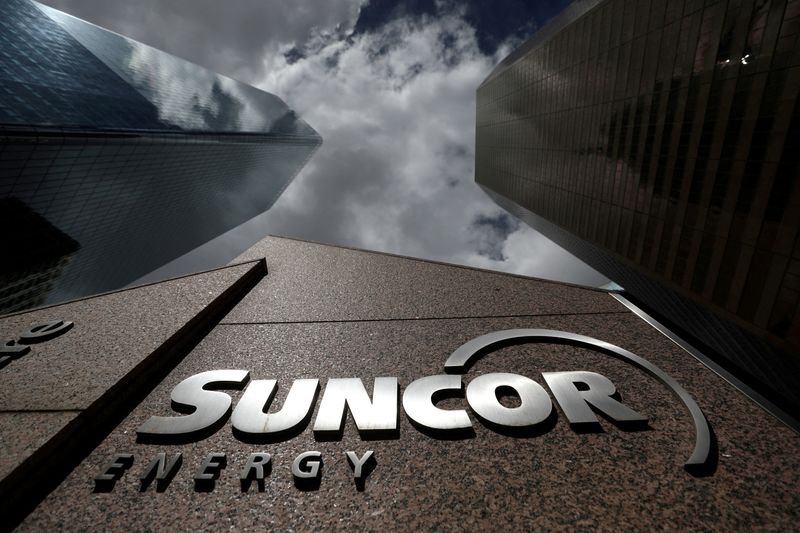 &copy; Reuters. FILE PHOTO: The Suncor Energy logo is seen at their head office in Calgary, Alberta, Canada, April 17, 2019. REUTERS/Chris Wattie