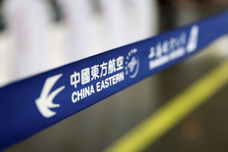 &copy; Reuters. FILE PHOTO: The logo of China Eastern Airlines is pictured at Beijing Capital International Airport in Beijing, China March 21, 2022. REUTERS/Tingshu Wang
