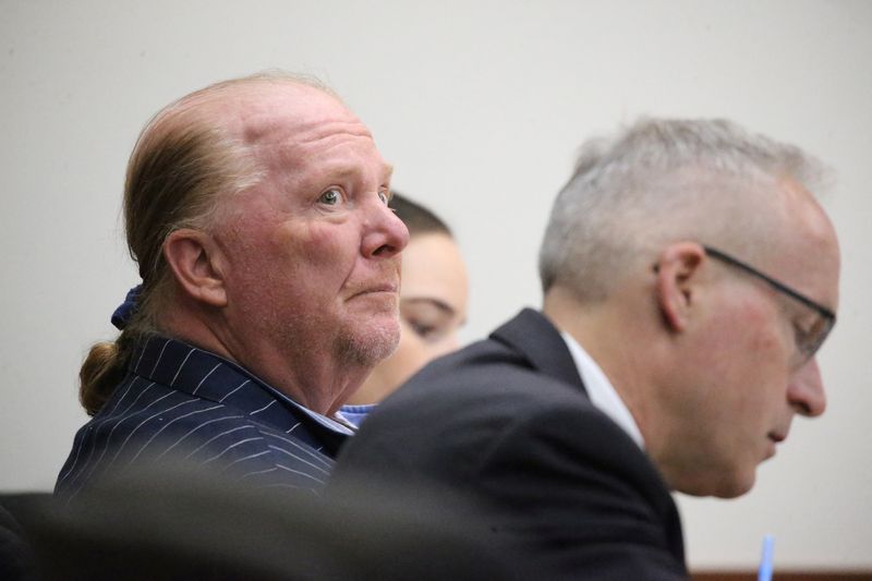 © Reuters. Celebrity chef Mario Batali listens during the second day of his trial on a criminal charge that he forcibly groped and kissed a woman at a restaurant in 2017, at Boston Municipal Court, in Boston, Massachusetts, U.S., May 10, 2022. Stuart Cahill/Pool via REUTERS
