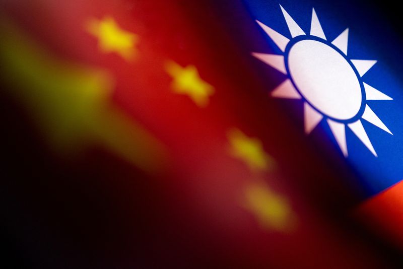 &copy; Reuters. FILE PHOTO: Chinese and Taiwanese printed flags are seen in this illustration taken, April 28, 2022. Picture taken April 28, 2022.  REUTERS/Dado Ruvic/Illustration