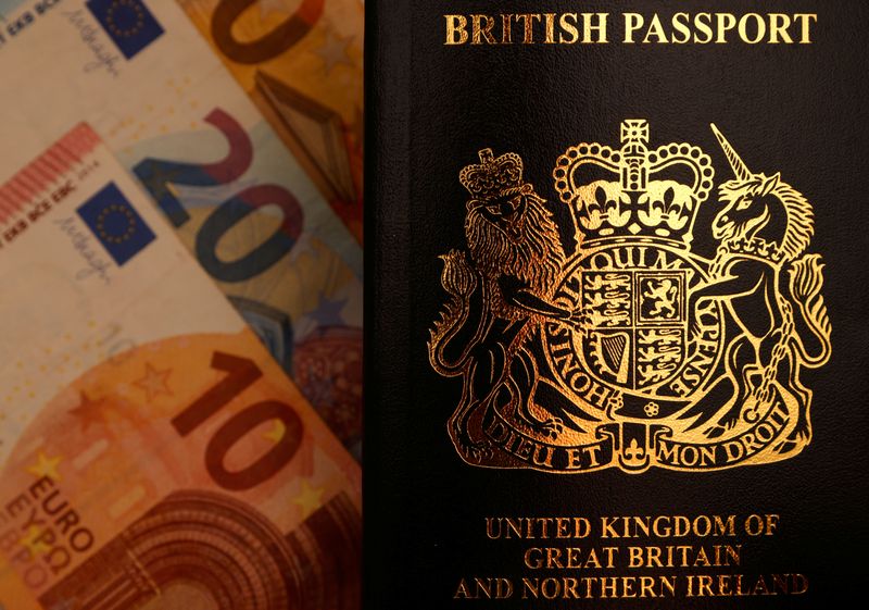 &copy; Reuters. FILE PHOTO: A British passport and Euro banknotes are seen in this illustration photograph taken December 11, 2020. REUTERS/John Sibley/Illustration