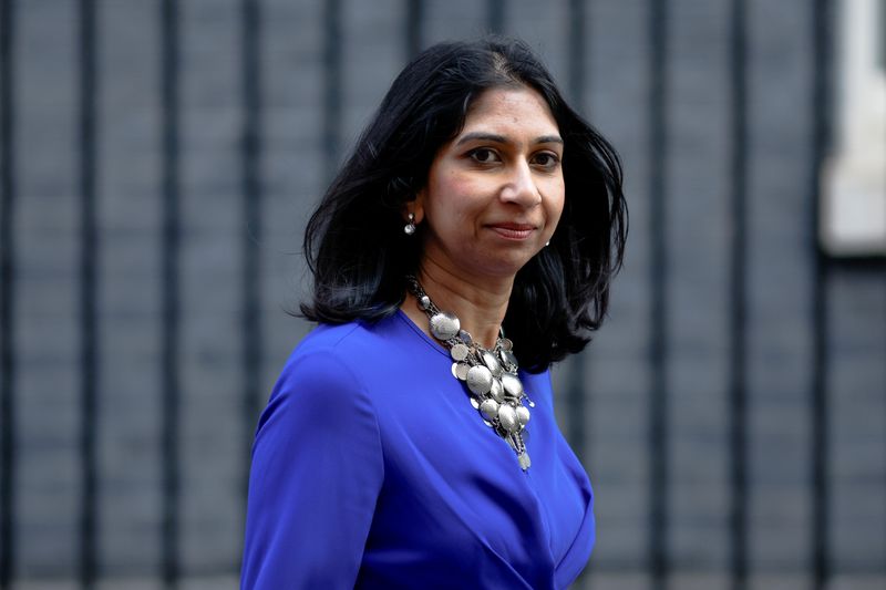 &copy; Reuters. FILE PHOTO: British Attorney General Suella Braverman walks outside Downing Street, in London, Britain, March 23, 2022. REUTERS/John Sibley
