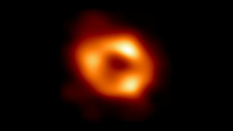 © Reuters. This is the first image of Sagittarius A* (or Sgr A* for short), the supermassive black hole at the center of our galaxy. It was captured by the Event Horizon Telescope (EHT), an array which linked together radio observatories across the planet to form a single 