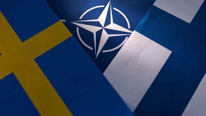 &copy; Reuters. FILE PHOTO: NATO, Swedish and Finnish flags are seen in this illustration taken May 12, 2022. REUTERS/Dado Ruvic/Illustration