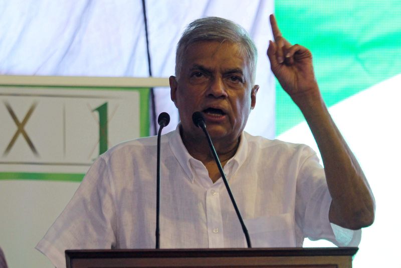 &copy; Reuters. FILE PHOTO: Ranil Wickremesinghe, leader of the United National Party speaks to his supporters during a campaign rally on the last day for rallies, ahead of country's parliamentary election scheduled for August 5, 2020, in Galle, Sri Lanka, August 2, 2020