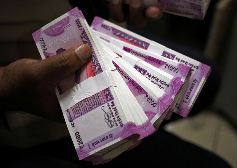 Indian rupee off record lows on RBI intervention; bond yields rise