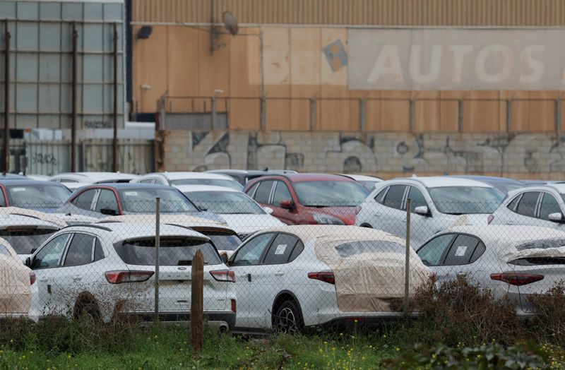 &copy; Reuters. FILE PHOTO: New cars are see parked in a industrial zone in Malaga, Spain, April 28, 2022. REUTERS/Jon Nazca