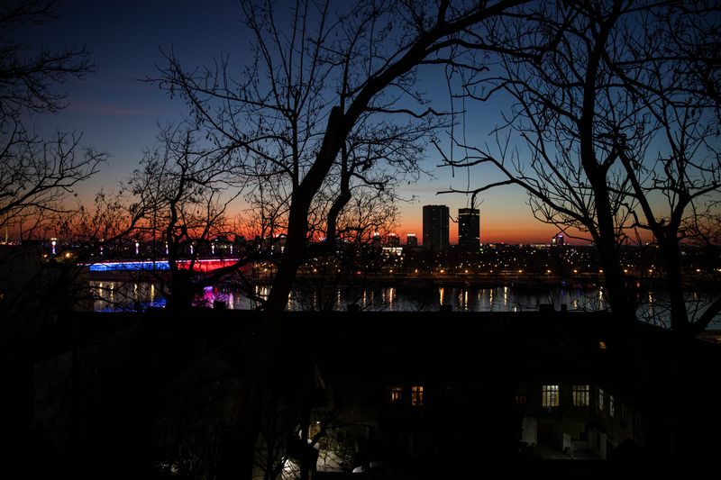 &copy; Reuters. FILE PHOTO: Office and residential buildings are pictured during sunset in Belgrade, Serbia, February 16, 2020. REUTERS/Marko Djurica