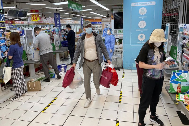 Some in Shanghai allowed out to shop; end of COVID lockdown in sight