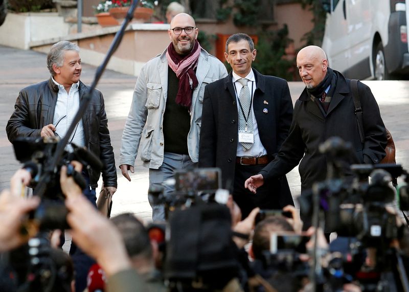 &copy; Reuters. FILE PHOTO: Pedro Salinas, Francois Devaux, Francesco Zanardi and Peter Iseley, survivors of sexual abuse, talk to reporters outside the Vatican in Rome, Italy February 20, 2019. REUTERS/Remo Casilli/File Photo