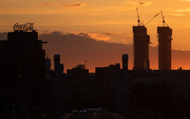&copy; Reuters. FILE PHOTO: A general view of city skyline and skyscrapers under construction during sunset as the spread of the coronavirus disease (COVID-19) continues in Moscow, Russia May 16, 2020. REUTERS/Maxim Shemetov