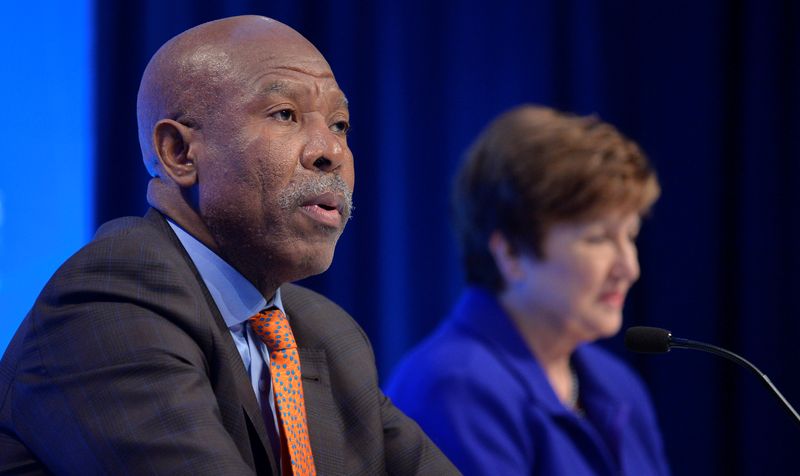 &copy; Reuters. South Africa's Reserve Bank Governor Lesetja Kganyago, who is also International Monetary Finance Committee (IMFC) chairman, makes remarks as IMF Managing Director Kristalina Georgieva listens during a closing press conference for the IMFC, during the IMF