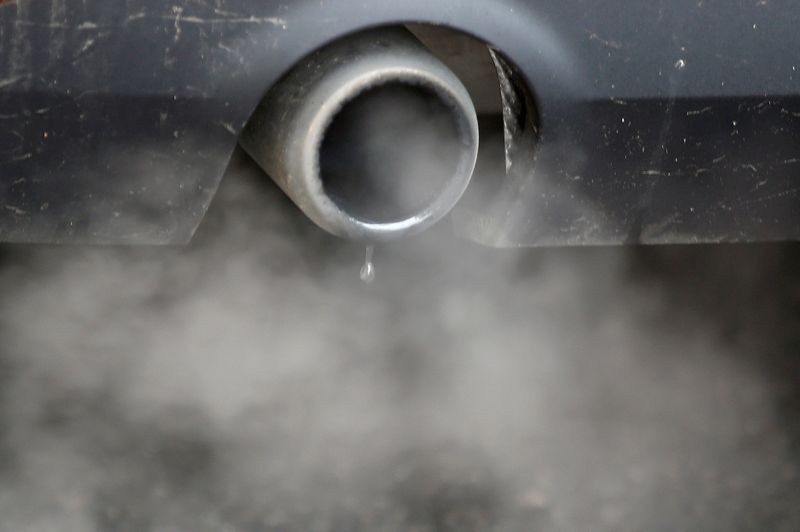 &copy; Reuters. FILE PHOTO: An exhaust emits fumes as a car is driven through Richmond in London, Britain December 2, 2016.  REUTERS/Peter Nicholls/