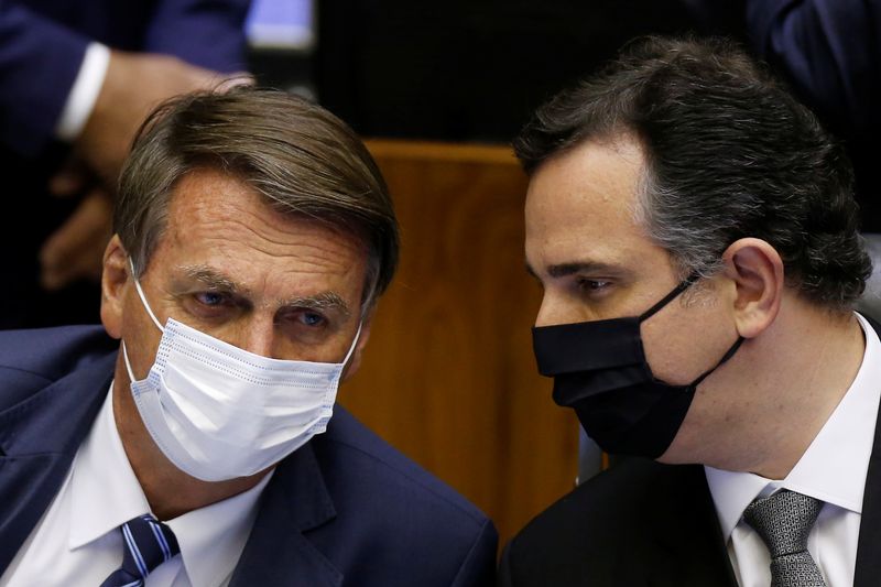 &copy; Reuters. Presidente Jair Bolsonaro ao lado do presidente do Senado, Rodrigo Pacheco, durante cerimônia de abertura do ano legislativo em Brasília
02/02/2022 REUTERS/Adriano Machado