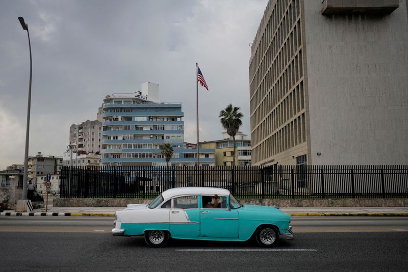 &copy; Reuters. FILE PHOTO: A vintage car passes by the U.S. Embassy in Havana, Cuba, October 30, 2020. REUTERS/Alexandre Meneghini