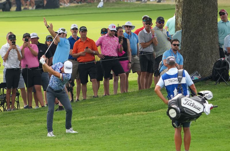 Golf-Zalatoris sails into PGA Championship lead while others blown off course