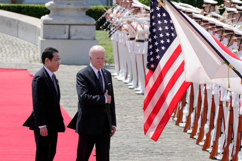&copy; Reuters. U.S. President Joe Biden and Japanese Prime Minister Fumio Kishida review an honor guard during a welcome ceremony for President Biden, at the Akasaka Palace state guest house in Tokyo, Japan, May 23, 2022. Eugene Hoshiko/Pool via REUTERS