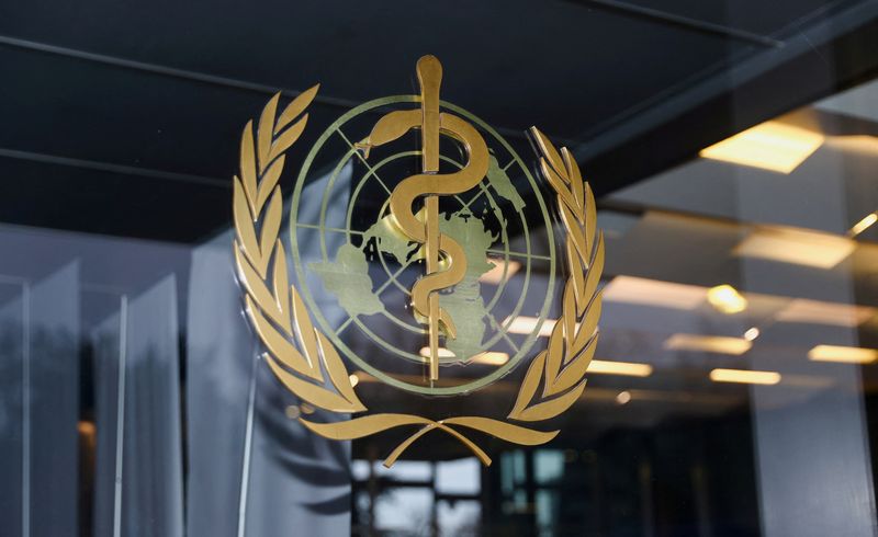 &copy; Reuters. FILE PHOTO: The World Health Organization logo is pictured at the entrance of the WHO building, in Geneva, Switzerland, December 20, 2021. REUTERS/Denis Balibouse